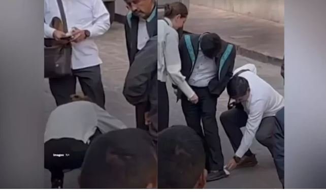 Llaman ´machista’ a Hugo Aguilar luego de que una mujer limpió de rodillas sus zapatos